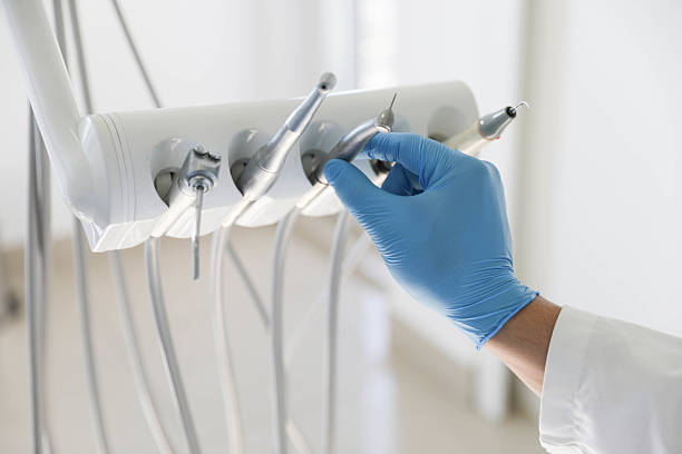 Professional Tooth Extraction technician working in Corpus Christi, TX